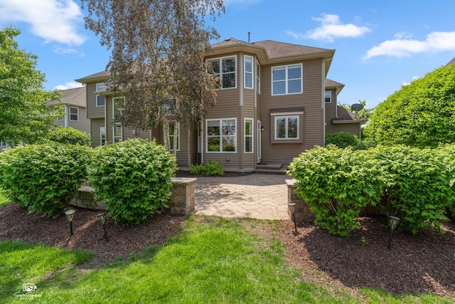 491 Bloomfield Cir W, Oswego, IL 60543 - rear view of house with a patio area