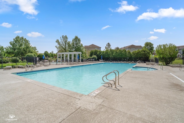 491 Bloomfield Cir W, Oswego, IL 60543 - community pool with a patio and a pergola