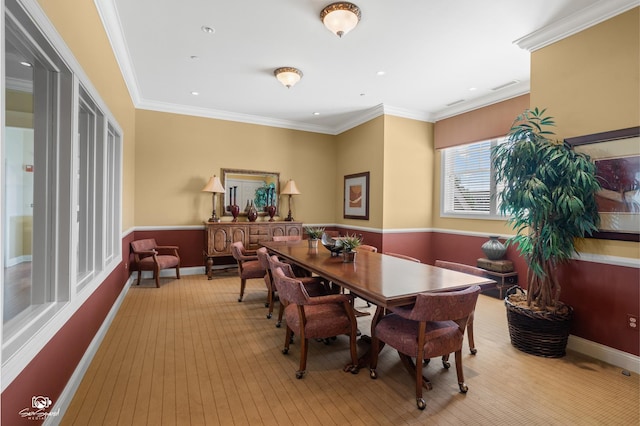 491 Bloomfield Cir W, Oswego, IL 60543 - dining area with light colored carpet, crown molding, and baseboards