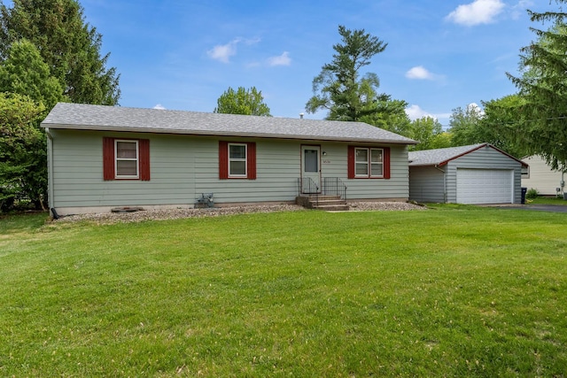 4539 Matthew Ave, Roscoe, IL 61073 - ranch-style house with a front lawn, asphalt driveway, an outdoor structure, and roof with shingles