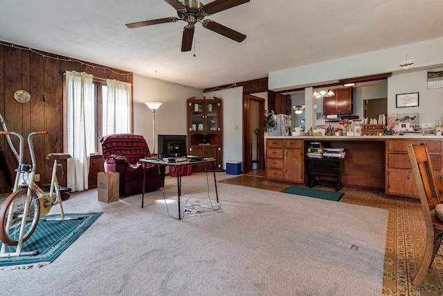 4539 Matthew Ave, Roscoe, IL 61073 - living area with a desk, ceiling fan, and light carpet