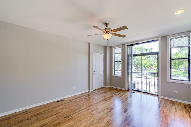 947 W 51st St, Chicago, IL 60609 - spare room featuring light wood finished floors, a ceiling fan, and baseboards