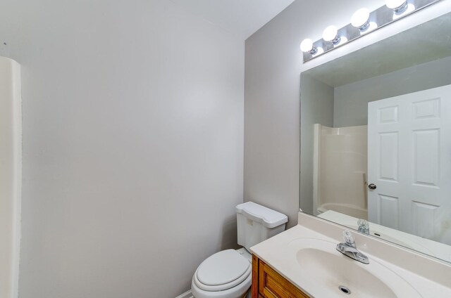 947 W 51st St, Chicago, IL 60609 - bathroom with vanity, toilet, and a shower