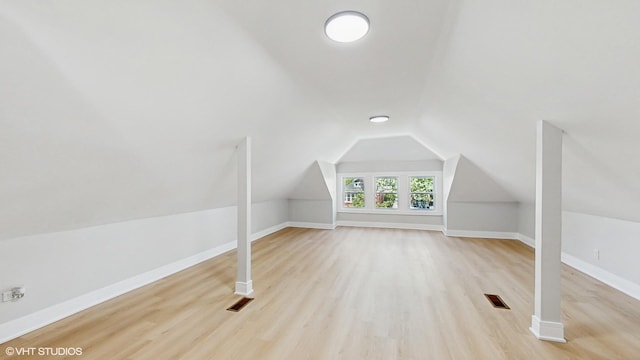 7545 S Perry Ave, Chicago, IL 60620 - bonus room with wood finished floors, vaulted ceiling, and baseboards