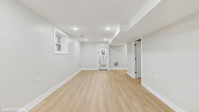 7545 S Perry Ave, Chicago, IL 60620 - finished below grade area with light wood-type flooring, baseboards, and recessed lighting
