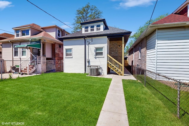 7545 S Perry Ave, Chicago, IL 60620 - back of property with central AC, brick siding, a shingled roof, and entry steps