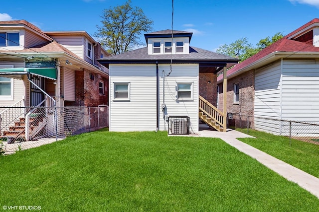 7545 S Perry Ave, Chicago, IL 60620 - rear view of property with a shingled roof, central air condition unit, and stairway