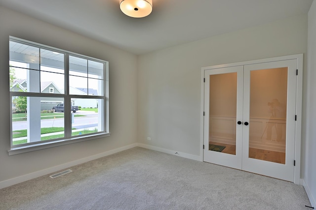 1568 Dempsey Dr, Saint Charles, IL 60174 - carpeted spare room with baseboards and french doors