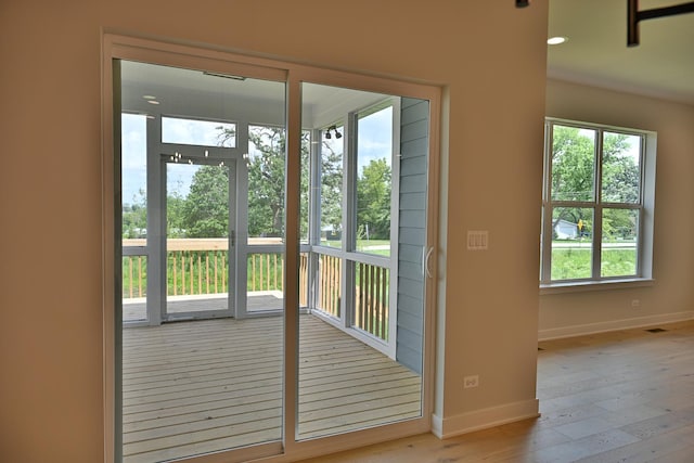 1568 Dempsey Dr, Saint Charles, IL 60174 - doorway to outside with hardwood / wood-style flooring and plenty of natural light