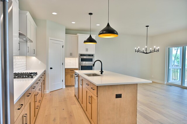 1568 Dempsey Dr, Saint Charles, IL 60174 - kitchen featuring stainless steel appliances, light wood-type flooring, recessed lighting, backsplash, and light countertops