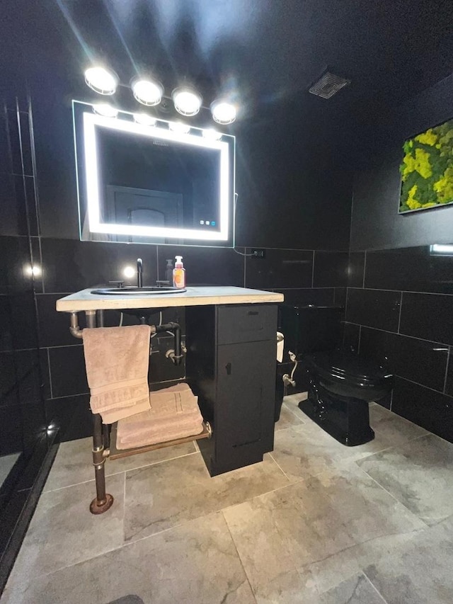 9420 S 77th Ct Unit 3E, Hickory Hills, IL 60457 - bathroom featuring tile walls, toilet, and vanity