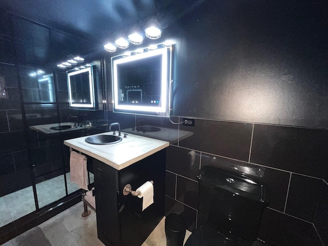 9420 S 77th Ct Unit 3E, Hickory Hills, IL 60457 - bathroom with tile walls, vanity, and a stall shower