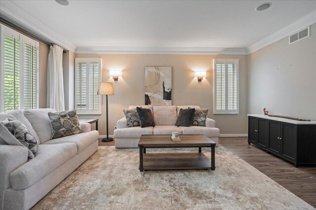 670 Leslie Ct, Carol Stream, IL 60188 - living area with healthy amount of natural light, crown molding, wood finished floors, and baseboards