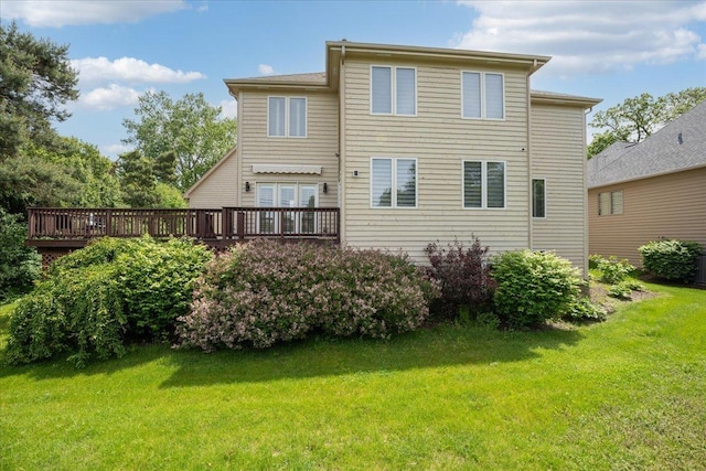 670 Leslie Ct, Carol Stream, IL 60188 - rear view of house with a yard, a wooden deck, and central air condition unit
