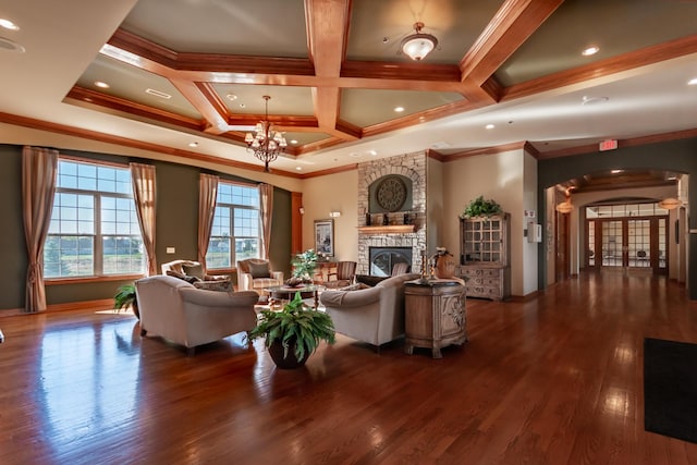 LOT37 W Caspian Cir, Lockport, IL 60441 - living area with a chandelier, a stone fireplace, wood finished floors, ornamental molding, and arched walkways