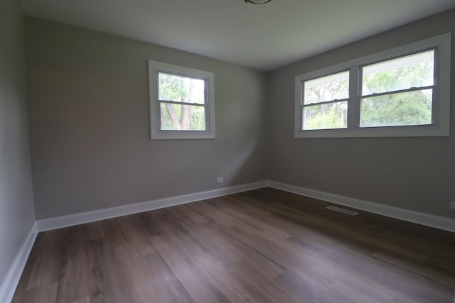 18310 Anthony Ave, Country Club Hills, IL 60478 - unfurnished room with dark wood-type flooring and baseboards
