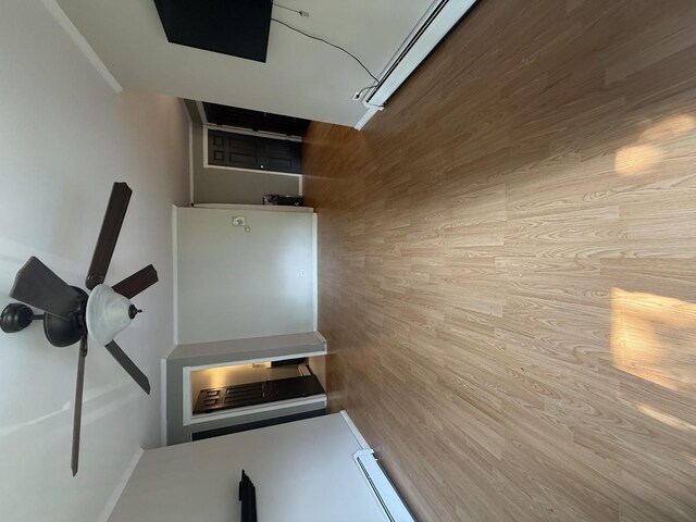 10940 S Worth Ave Unit 9, Worth, IL 60482 - unfurnished bedroom featuring wood finished floors