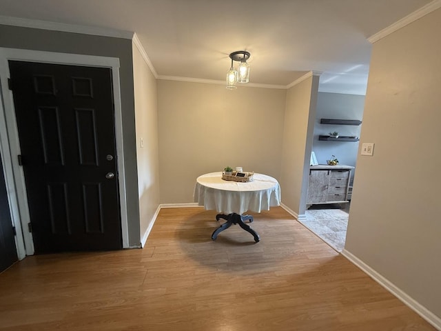 10940 S Worth Ave Unit 9, Worth, IL 60482 - entryway with light wood finished floors, ornamental molding, and baseboards