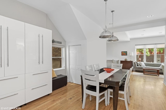 2637 W Huron St, Chicago, IL 60612 - dining area featuring light wood finished floors, recessed lighting, and vaulted ceiling