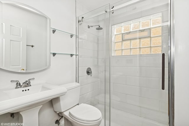 2637 W Huron St, Chicago, IL 60612 - bathroom with toilet, a shower stall, and a sink