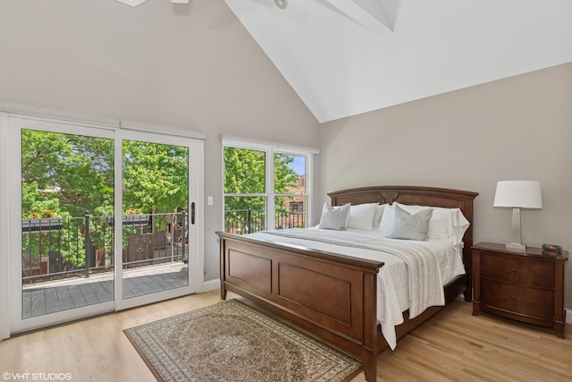 2637 W Huron St, Chicago, IL 60612 - bedroom with access to outside, light wood-type flooring, and high vaulted ceiling
