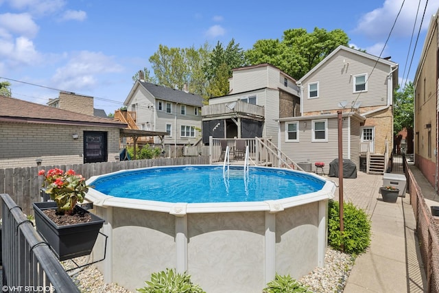 2637 W Huron St, Chicago, IL 60612 - view of pool with a fenced backyard, a residential view, and central AC unit