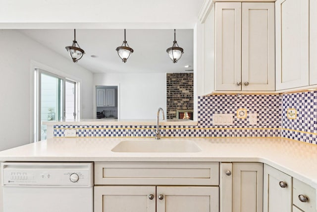 1946 Briarcliffe Blvd, Wheaton, IL 60189 - kitchen with white dishwasher, decorative backsplash, light countertops, and a peninsula