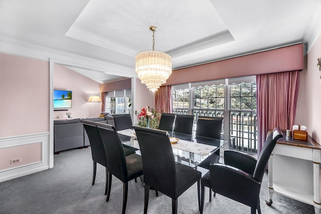 514 Cherbourg Dr, Buffalo Grove, IL 60089 - carpeted dining space featuring a chandelier, crown molding, and a raised ceiling