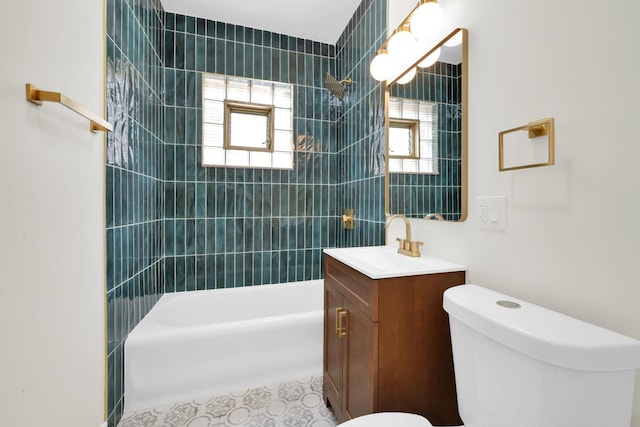 7535 S Aberdeen St, Chicago, IL 60620 - bathroom featuring toilet, vanity, shower / bath combination, and tile patterned flooring