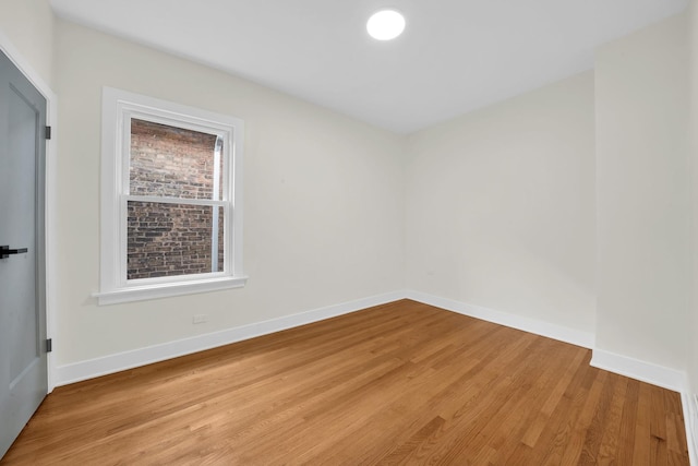 7535 S Aberdeen St, Chicago, IL 60620 - unfurnished room featuring light wood finished floors and baseboards