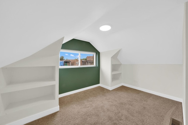 7535 S Aberdeen St, Chicago, IL 60620 - bonus room featuring built in features, carpet flooring, baseboards, and vaulted ceiling