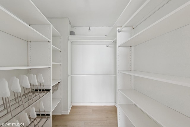 10 E Ontario St Unit 4805, Chicago, IL 60611 - spacious closet featuring wood finished floors