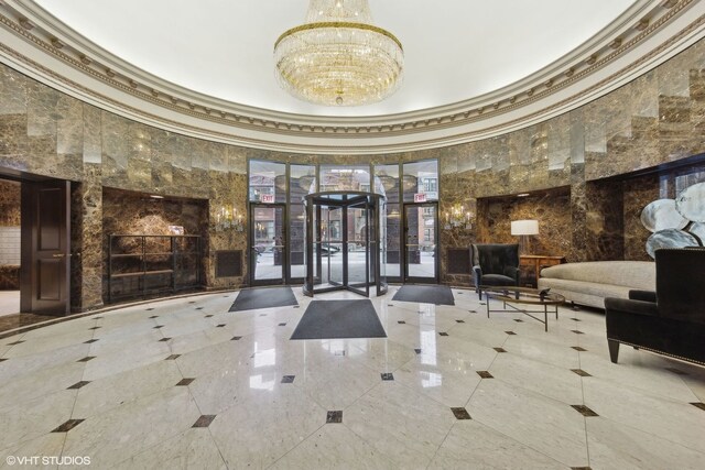 10 E Ontario St Unit 4805, Chicago, IL 60611 - building lobby with ornamental molding and a towering ceiling