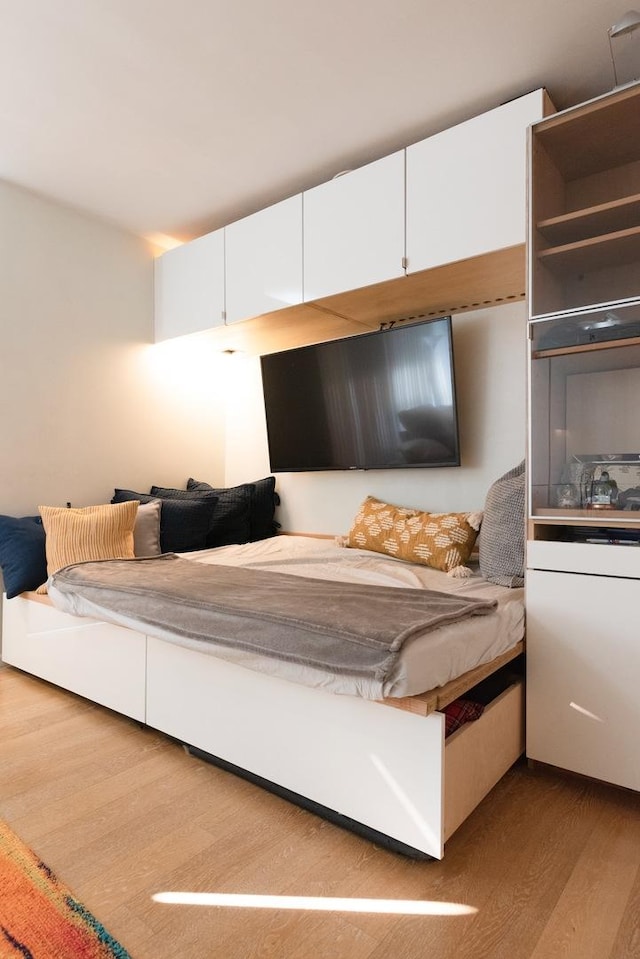10 E Ontario St Unit 4805, Chicago, IL 60611 - bedroom featuring wood finished floors