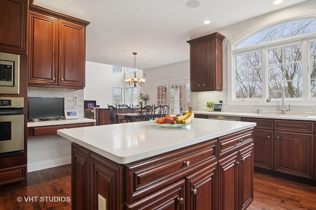 4824 Darlene Ct E, Long Grove, IL 60047 - kitchen with stainless steel appliances, a sink, light countertops, tasteful backsplash, and recessed lighting