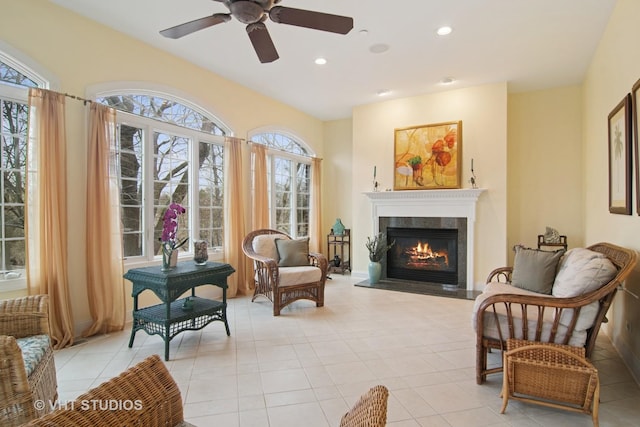 4824 Darlene Ct E, Long Grove, IL 60047 - sitting room with ceiling fan, a glass covered fireplace, recessed lighting, and light tile patterned floors