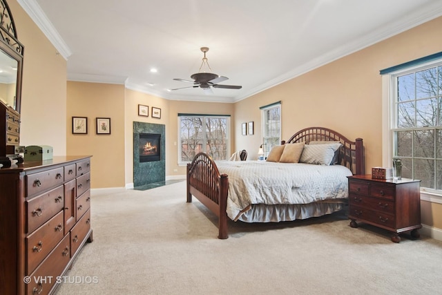 4824 Darlene Ct E, Long Grove, IL 60047 - bedroom with light carpet, multiple windows, baseboards, ornamental molding, and a fireplace