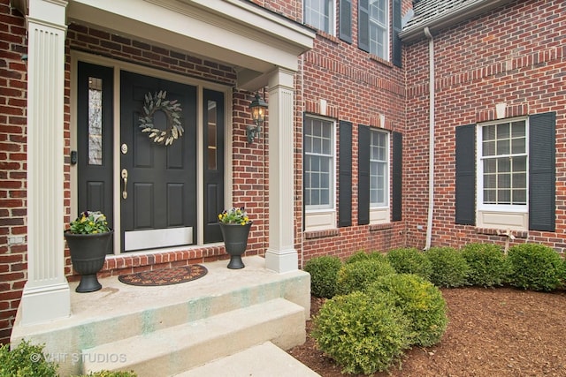 4824 Darlene Ct E, Long Grove, IL 60047 - view of exterior entry featuring brick siding and covered porch