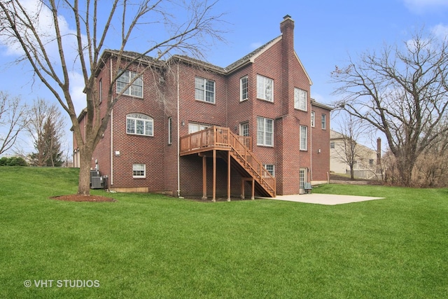 4824 Darlene Ct E, Long Grove, IL 60047 - rear view of house with stairs, a wooden deck, a chimney, a patio, and a lawn