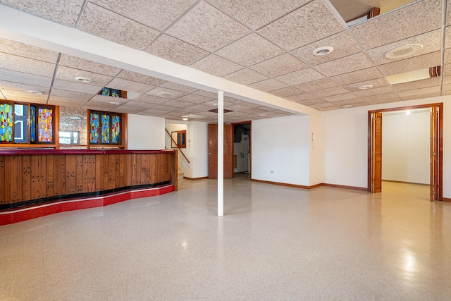 533 Lomond Dr, Mundelein, IL 60060 - finished below grade area featuring a paneled ceiling, baseboards, stairs, and a dry bar