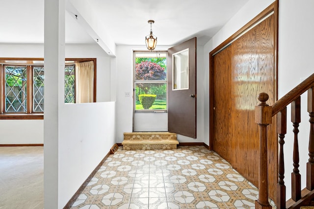 533 Lomond Dr, Mundelein, IL 60060 - entrance foyer with baseboards, tile patterned floors, and stairs