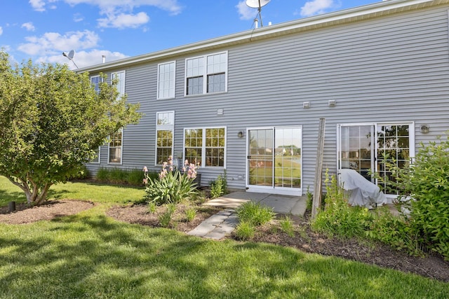 453 Lancaster Dr, Pingree Grove, IL 60140 - back of house featuring a lawn