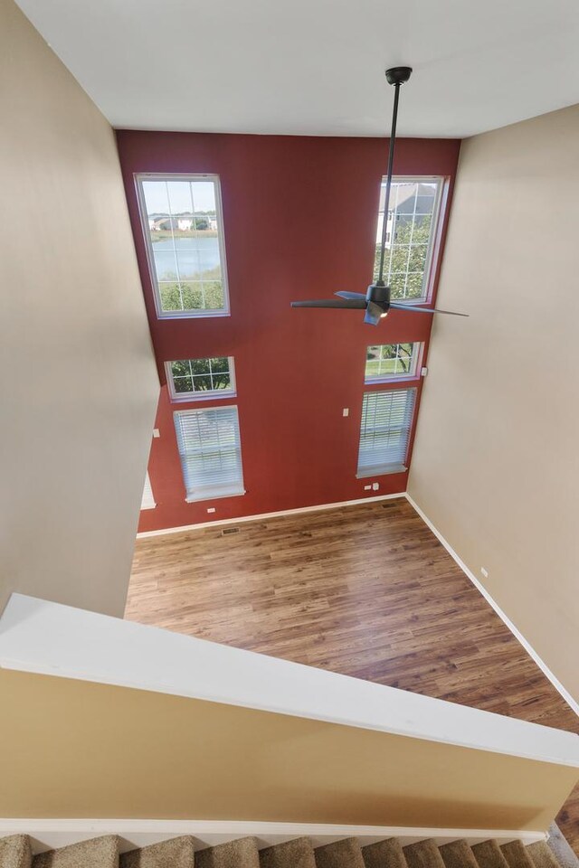 453 Lancaster Dr, Pingree Grove, IL 60140 - stairway with wood finished floors and baseboards