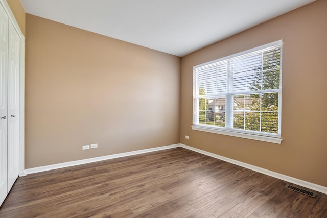 453 Lancaster Dr, Pingree Grove, IL 60140 - spare room featuring baseboards, plenty of natural light, and wood finished floors