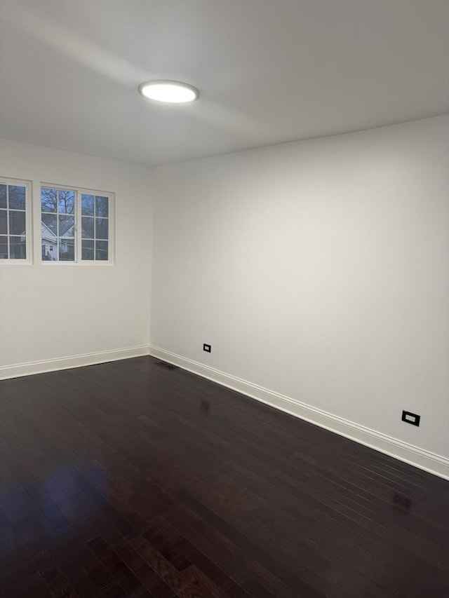 6903 S Ada St, Chicago, IL 60636 - empty room with baseboards and dark wood finished floors