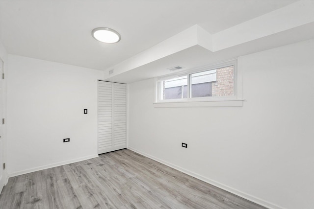6903 S Ada St, Chicago, IL 60636 - unfurnished bedroom featuring light wood finished floors, a closet, and baseboards