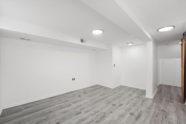 6903 S Ada St, Chicago, IL 60636 - finished below grade area with light wood-type flooring and baseboards