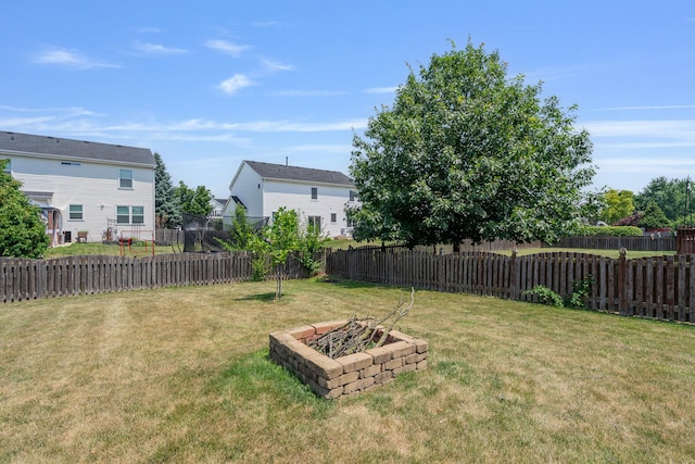 1453 Waterside Dr, Bolingbrook, IL 60490 - fenced backyard with a fire pit