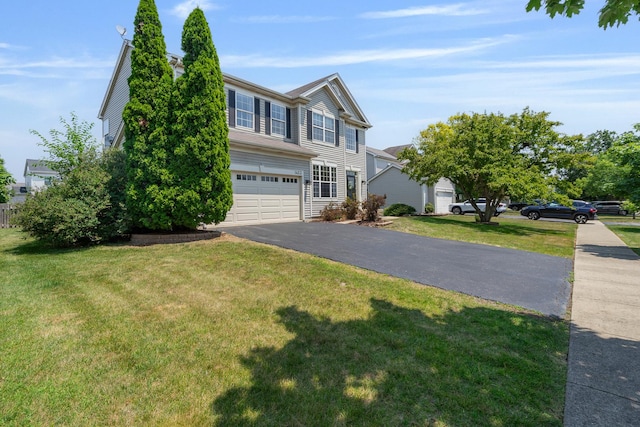 1453 Waterside Dr, Bolingbrook, IL 60490 - traditional-style home with a garage, asphalt driveway, and a front yard