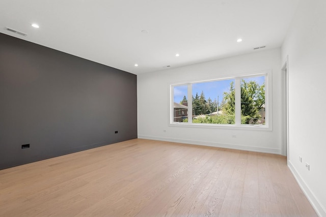 9214 N Washington St, Niles, IL 60714 - spare room featuring recessed lighting, light wood finished floors, and baseboards